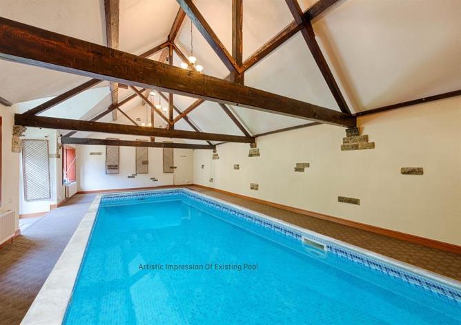 The ground floor also benefits from a sitting room with open fire, library, games room (which was originally constructed to be an indoor swimming pool with its own changing rooms), utility room,