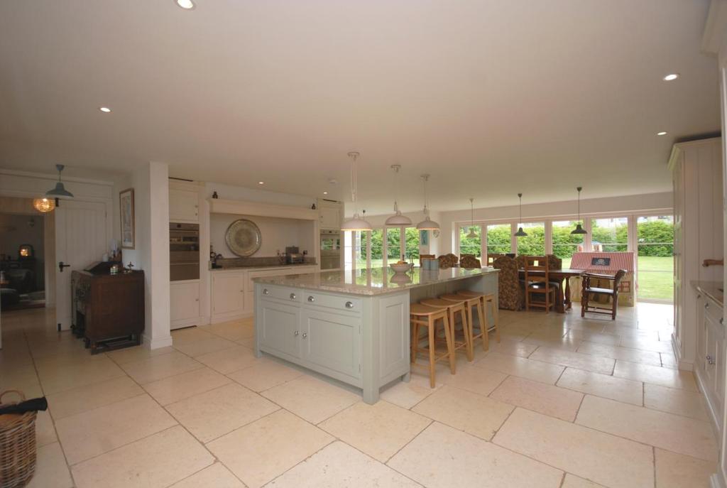 QUINCE COTTAGE, LLYSWORNEY, VALE OF GLAMORGAN, CF71 7NQ AN EXCEPTIONAL, 5 BEDROOM HOME SIGNIFICANTLY EXTENDED AND THOROUGHLY MODERNISED THROUGHOUT WITH STUNNING KITCHEN TO THE VERY HEART OF THE HOUSE.