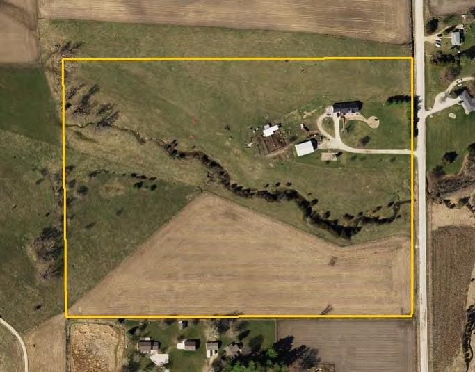 Aerial Photo House, Buildings and 30 Acres Total Acres: 30.00 Crop Acres: 9.30* Soil Productivity: 39.0 CSR2 Bedrooms: 4 Bathrooms: 3 Total Finished SF: 3,054 Address: 5220 N.