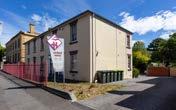 The property is a two storey heritage office building,