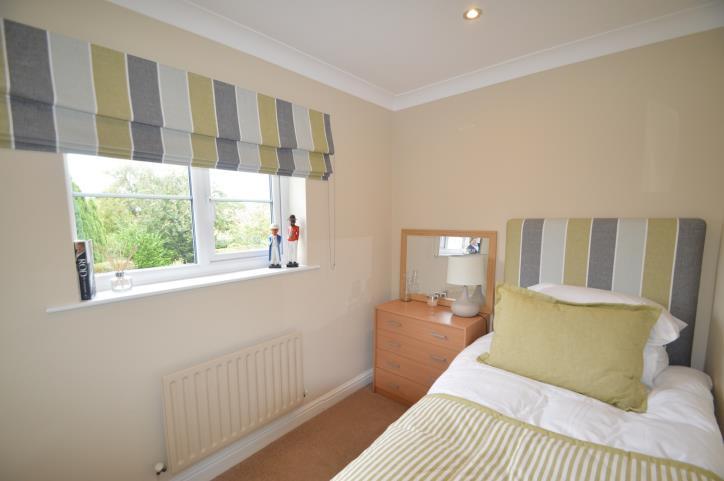 BEDROOM THREE 2.60 m(8'6'') x 1.90 m(6'3'') Radiator. Casement window to the rear. Coving. Recessed ceiling lights. ATTACHED GARAGE 4.