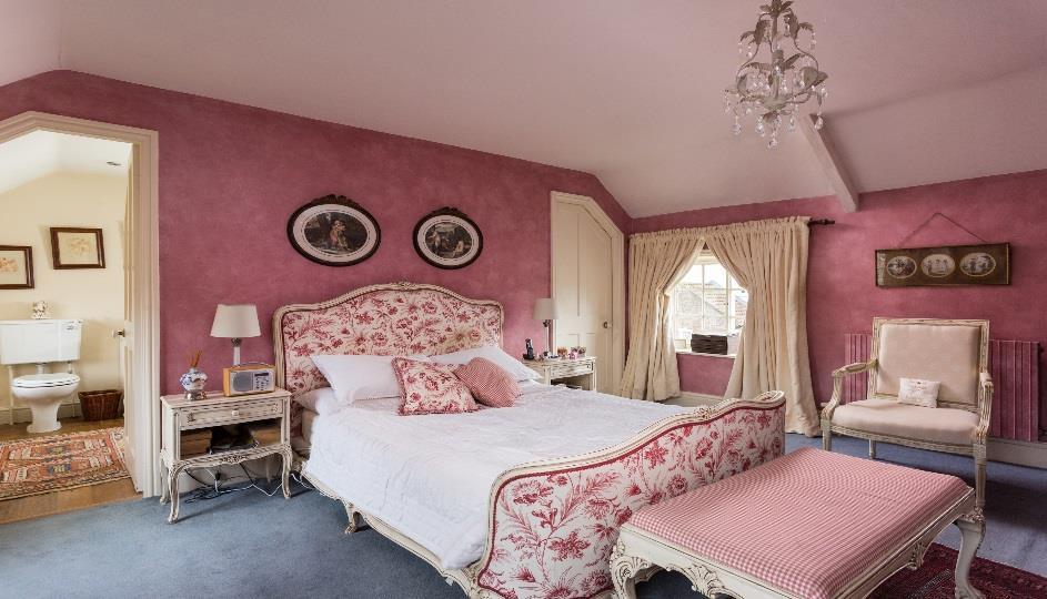 The first floor nicely combines the old-world charm of a period cottage with the facilities for modern living. It has many nooks and crannies amongst the four double bedrooms and three bathrooms.