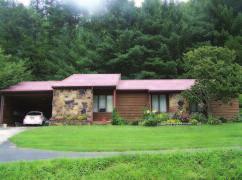 421 Hwy, manchester, Ky #99460 This beautiful cedar wood ranch style home offers 3 bedrooms, 2 baths, living room with vaulted cedar wood ceiling and
