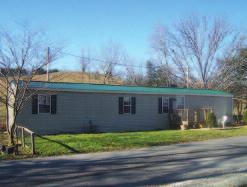Plus a 1600 sq ft work shop. $89,900 BARBOURVILLE #98738 Great Location! Located right of 25E and in front of Wal-mart in Barbourville.