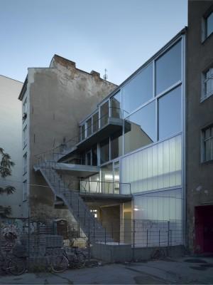 Because Arno Brandlhuber's construction is not only pragmatically DIY - it's also gorgeous Reduced to the most basic elements, the design of this bare-bones space, built on the ruins of an abandoned