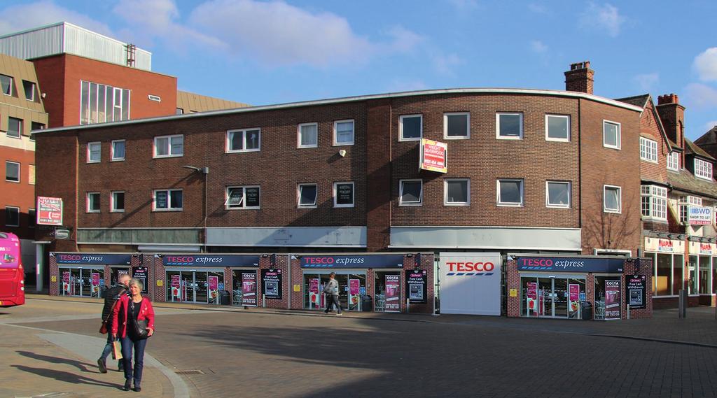 TESCO CURRENTLY FITTING OUT BEHIND HOARDINGS Anchored Retail & Office