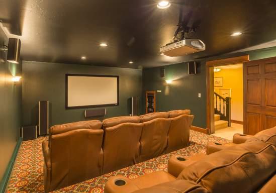 The home s lower, walk-out level, is all about having fun! For starters, there s the big screen media room, modeled after a real theater with state-of-the-art projectors and sound systems.