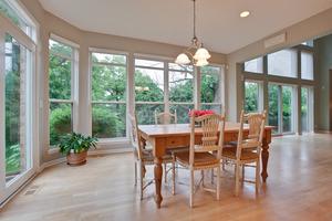 Dining/Kitchen Spacious and bright, the Breakfast Room with windows on two sides opens to the Great Room and Kitchen.