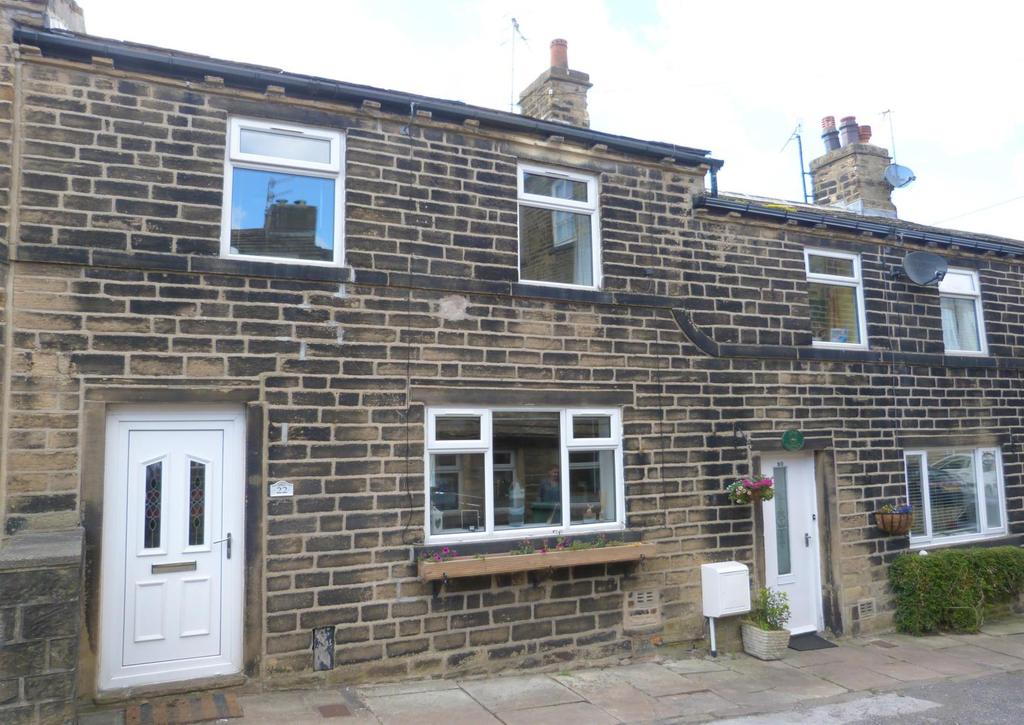 Moss Row, Wilsden, Bradford, BD15 0EP IDEAL FOR A FIRST TIME BUYER / INVESTOR Immaculately presented two bedroom cottage with extensive garden.