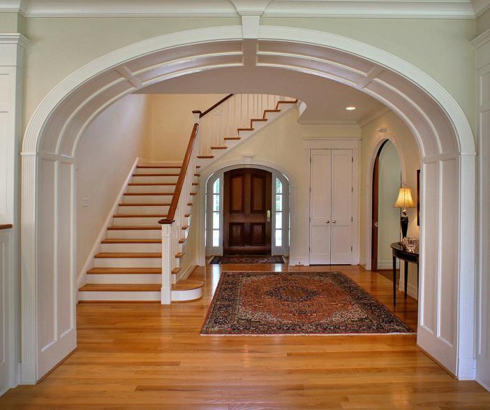 Main Level Foyer 17 x 14 Hardwood floor; cove crown moulding; double depth coat closet; turned staircase;