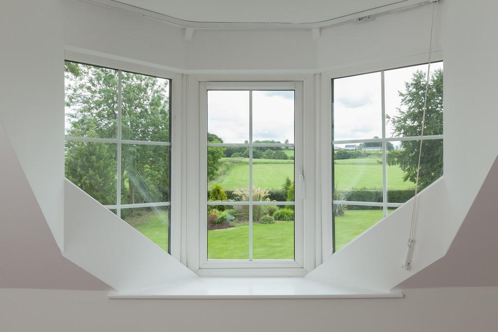 GALLERY LANDING Velux skylight. Walk in hotpress with hot water tank and shelving.