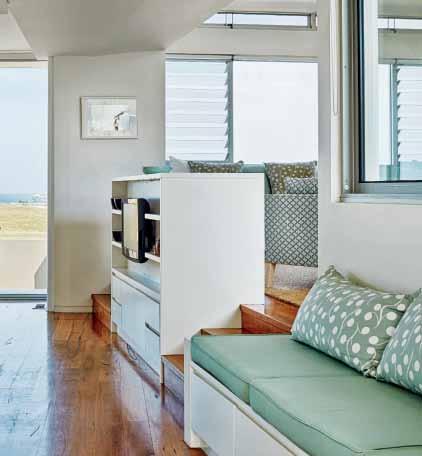 Project by Utz Sanby Architects With five generous storage drawers, the built-in sofa under the window keeps this coastal home clutter free.
