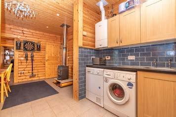 Four bed Finnish log home Range of useful buildings 28 acres of pasture Certified Caravan Club location Suitable for a variety of uses Extending to 33.16 acres (13.