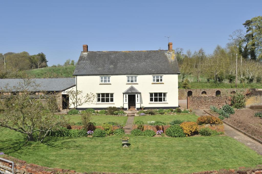 A delightful detached five bedroom farmhouse, enjoying an elevated position with the benefit of far reaching southerly views. Main property is a 7 bedroomed former guest house.