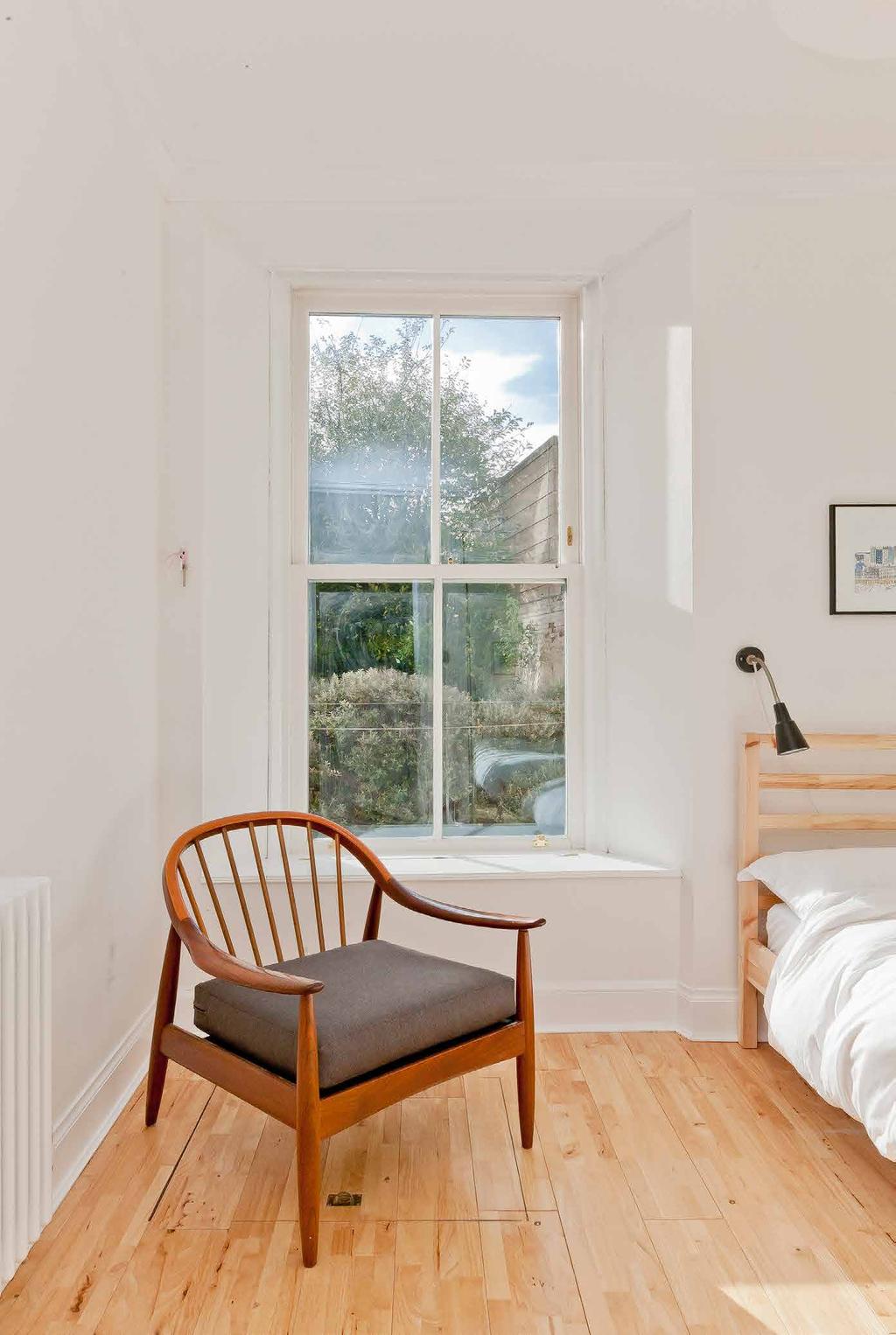 ...Enjoying a tranquil, southwesterly aspect overlooking the leafy rear garden, both double bedrooms boast magnificent