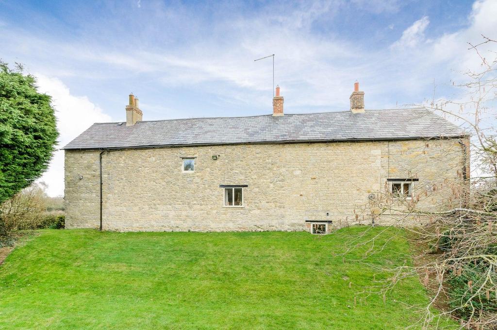 Outside The property stands in a prominent position with far reaching views on the edge of the village.