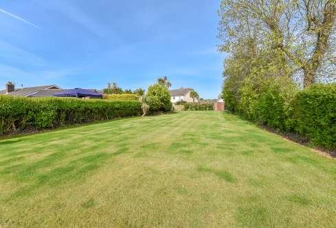 fully enclosed rear garden in lawns with westerly aspect, extensive terrace