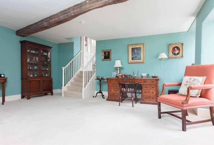 required. To the right of the entrance hall are two well proportioned display rooms, both with original floorboards, fireplaces and large windows to the front.