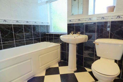 BATHROOM throughout. The property also benefits from a newly installed boiler (circa 1 year old). TO VIEW Strictly by appointment please telephone Marsh & Marsh Properties on 01422 648 400.