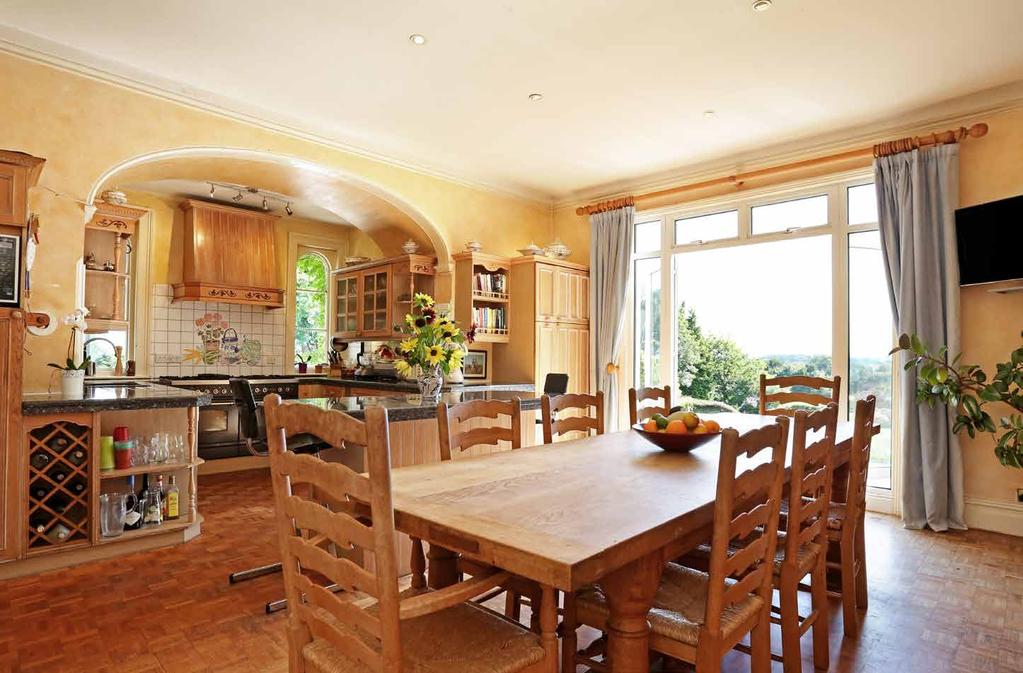 Description Set in an elevated position with stunning southerly views this wonderful family home offers accommodation over three floors.