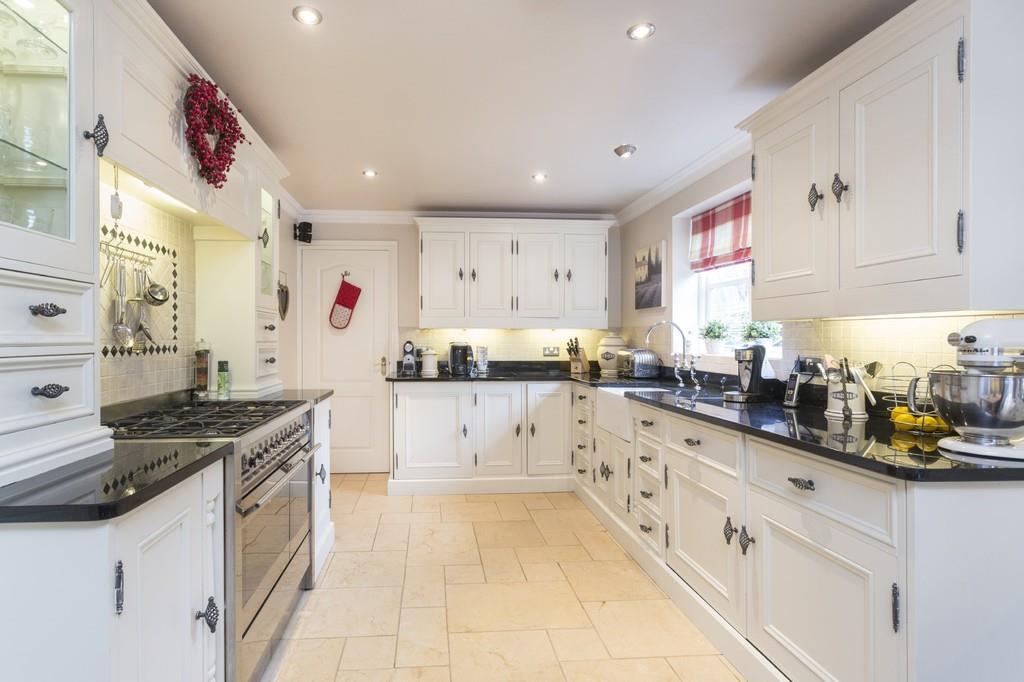 On entering this superbly presented home you will find a splendid reception hallway with limestone tiled flooring, stairs rising to the first floor and a deep cloaks cupboard.