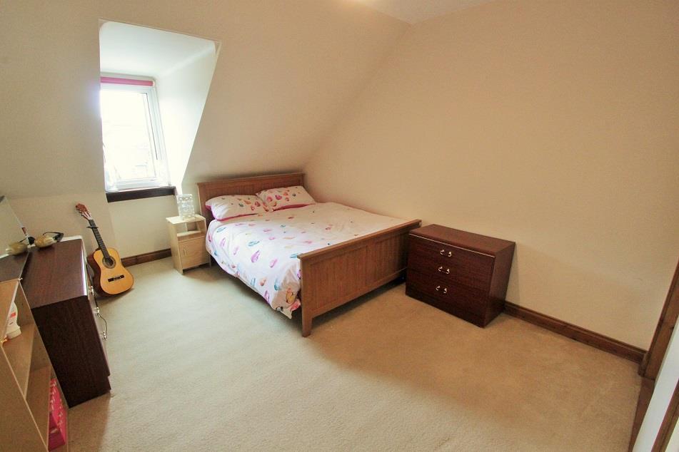 fire, electric storage heater, and fitted carpet. BEDROOM ONE 4.6m x 3.