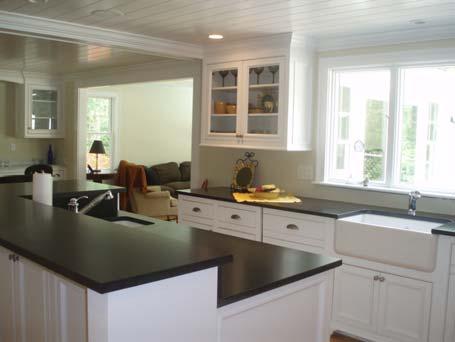 Gourmet Kitchen: Nearly 200 square foot custom re-designed using high quality finishes and appliances Hardwood floor