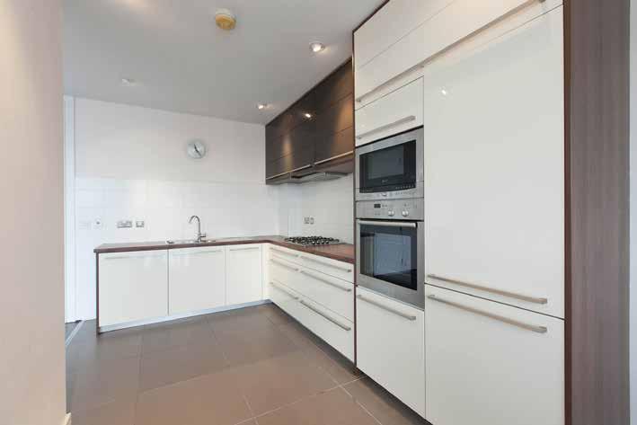 Kitchen Area: Excellent range of high and low level units. 1.5 bowl stainless steel sink unit with mixer tap.
