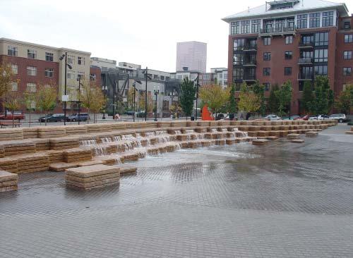 (Portland, Oregon) Fountain provided in mixed use neighborhood provides a central gathering