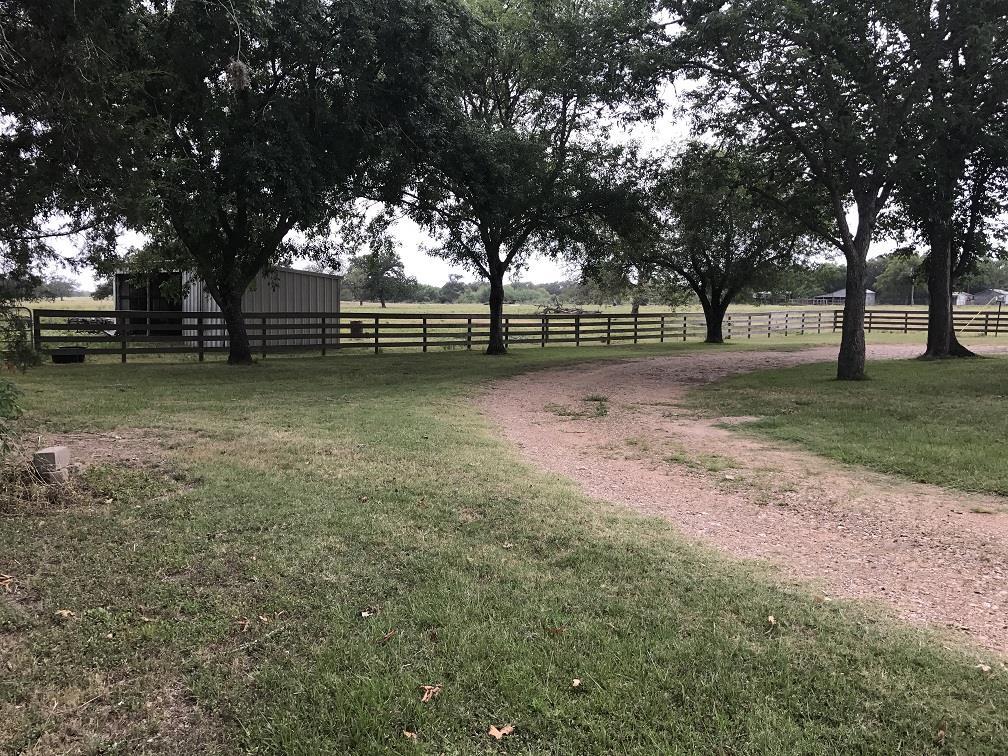 This beautiful ranch style home sits on 1.577 acres located approximately 9 miles from Columbus Texas.