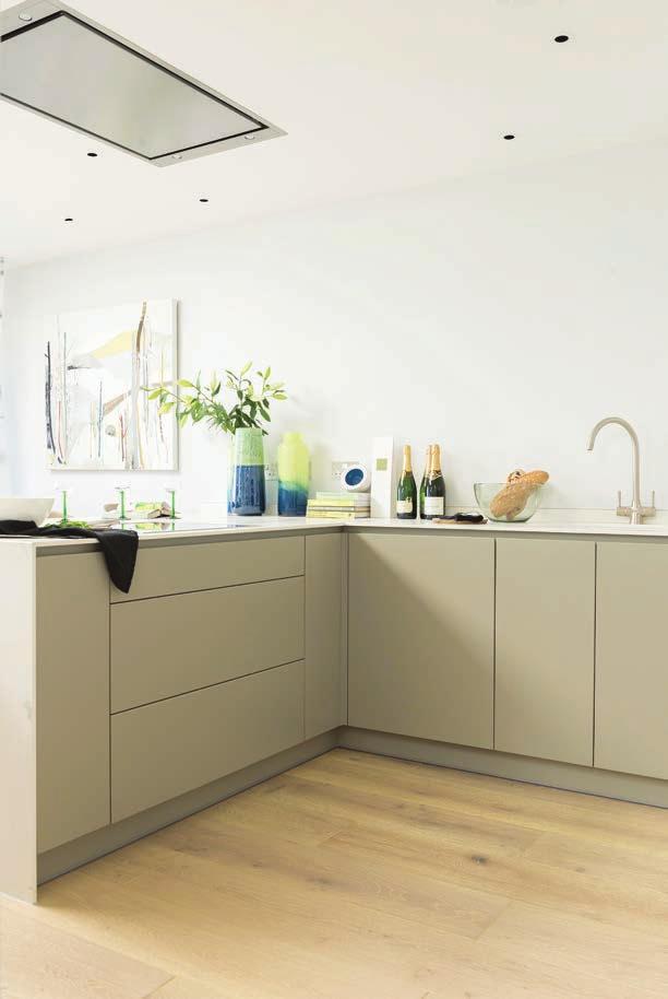 EXQUISITE ATTENTION TO DETAIL Our handmade British built contemporary painted kitchens feature an alcove breakfast bar, 12mm Neolith worktops, Kohler under mount cast iron sinks and Gutman ceiling