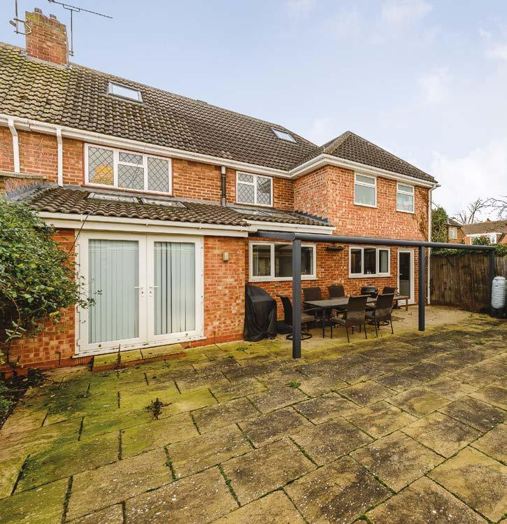 Step outside 8 Old Road The enclosed rear garden is all paved so extremely low maintenance, it has a contemporary garden veranda perfect for alfresco dining all year round.