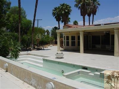 pool, spa and backyard.