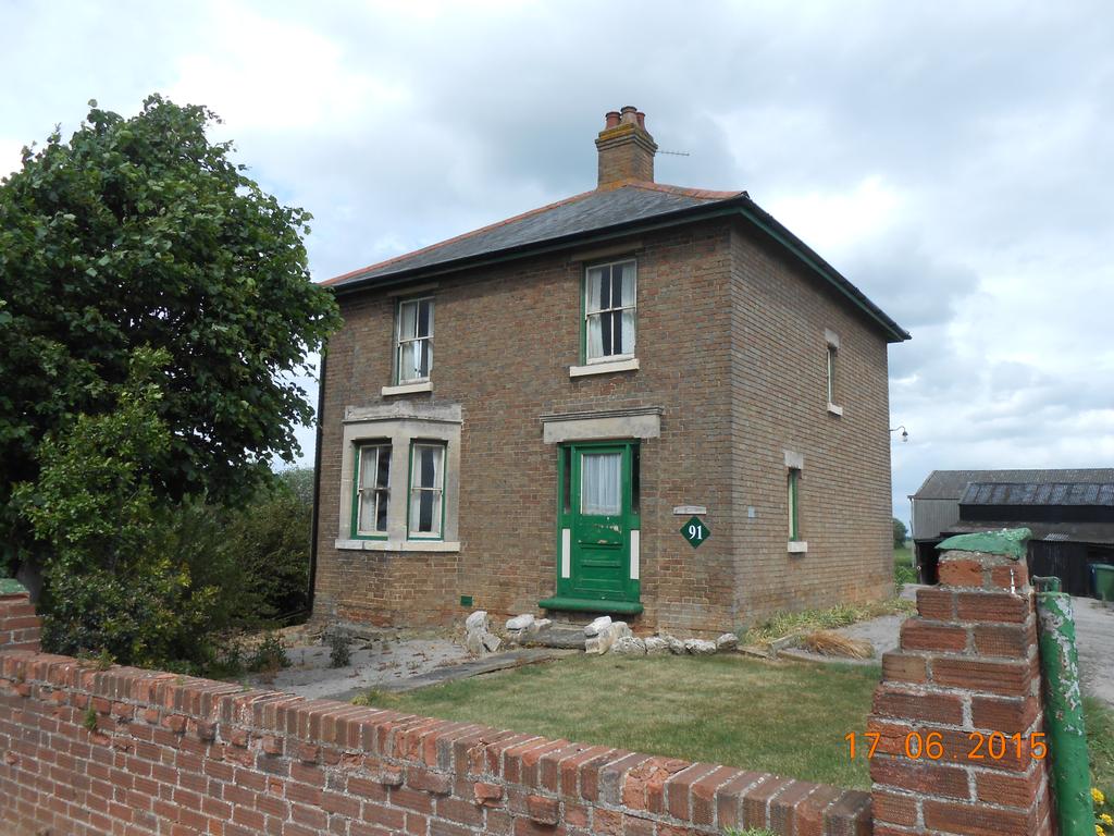 WITH VACANT POSSESSION "THE LAURELS" 91 UGG MERE COURT ROAD, RAMSEY ST. MARY, RAMSEY, HUNTINGDON, PE26 2RQ. ~~~ A FENLAND SMALLHOLDING comprising FARMHOUSE, BUILDINGS AND LAND the whole containing 39.