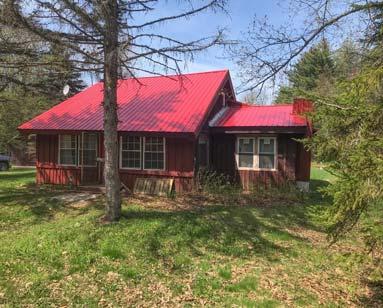 $59,900 2 BR/1 bath camp on 0.54 acres. Furnishings included.