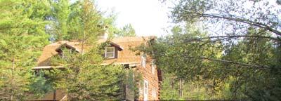 5 bath log home on 5 acres with attached 2 car garage & wood stove for supplemental