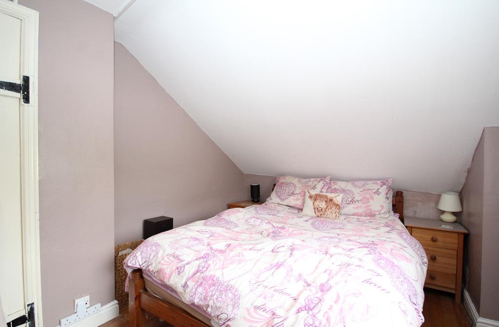 The final bedroom accommodation which is located above the snug and utility room, provides space