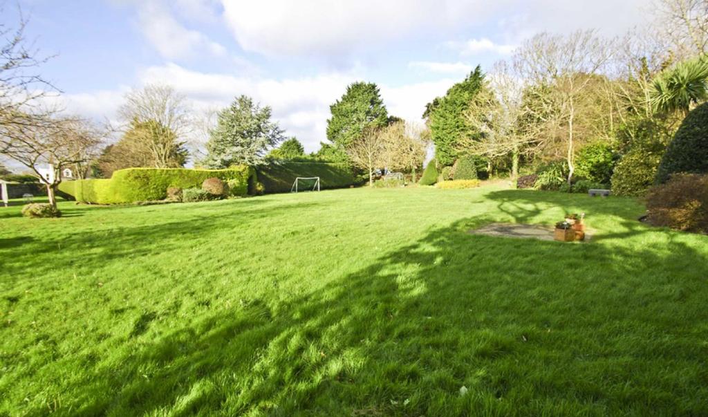 bordered by mature trees and hedging providing privacy and seclusion.