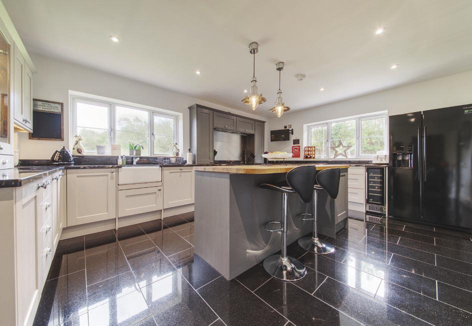 (all distances are approximate) Large modern five-bedroom house set in a large plot Situation Barton Seagrave village offers a range of amenities including a post office, petrol station, shops, a