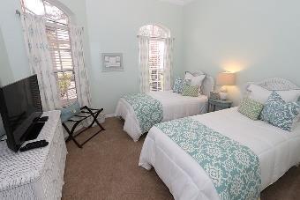 quality linens and his/her walk-in closets, Queen guest room with private bath, well-appointed kitchen plus all the comforts
