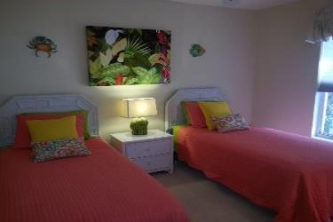 bedding, includes full washer/dryer in unit, Wi-Fi and cable included, 2 furnished lanais, and a