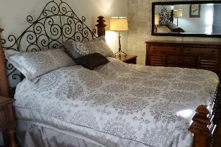 Master with king bed, walk-in closet, private 3-pc bathroom. Guest with queen bed, 2 nd 3-pc bathroom just outside room.