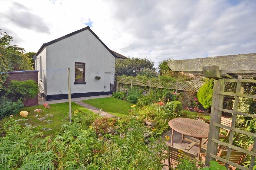 parking and a secluded garden, currently with a good income from holiday letting