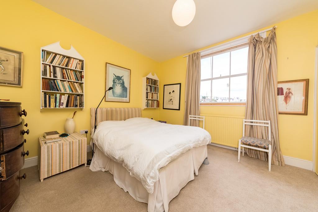 Private and peaceful, the welcoming master bedroom has restful proportions and relaxing views over gardens and striking mews houses below, so it s not over looked.