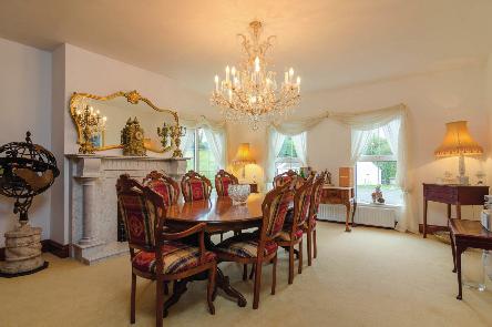 DINING ROOM: 19' 7" x 15' 7" (5.96m x 4.75m) Impressive marble fireplace and hearth. Coal effect gas fire. PVC double glazed sliding door to Patio.