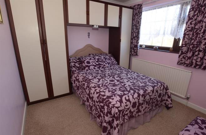 11m (6' 11")MAX Double glazed window to the front and a radiator BEDROOM ONE 4.