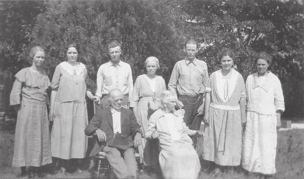 William Henry Thompson & Family William & Martha Thompson sitting with Children in the year 1923: (l-r) Jessie Irene Thompson Scott, Martha Frances Thompson Petri, John Finis THOMPSON Sr.