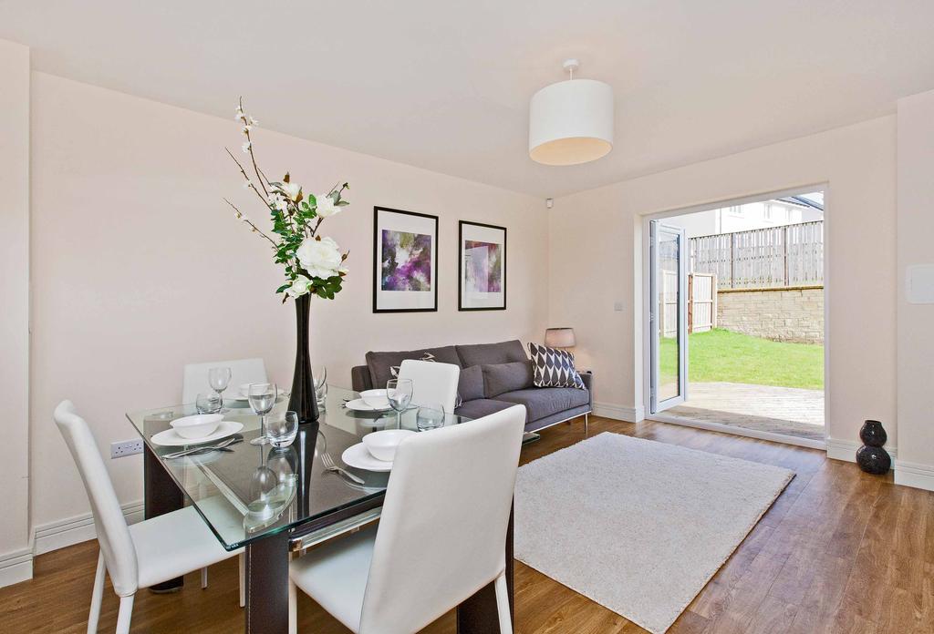 Continuing through to the heart of the home, this property benefits from a most desirable open-plan kitchen/dining