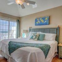 On the second floor, you'll find one room equipped with two bunks beds a master suite (King) with adjoining bath and oceanfront deck; and a cheerful bedroom
