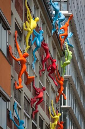 bright-coloured plastic sculptures climb the façade Project is not public!
